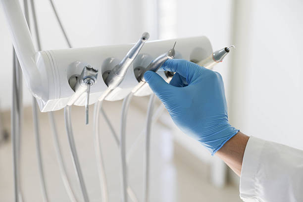 Professional Tooth Extraction technician working in Janesville, WI